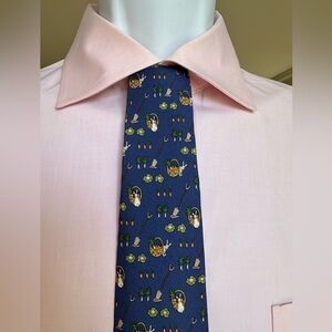 Hermes. Blue Silk Tie with Garden Print 100% silk tie. Made in France